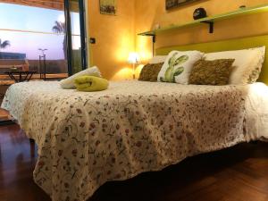 A bed or beds in a room at Rizzi Marianna B&B