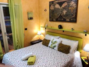 A bed or beds in a room at Rizzi Marianna B&B