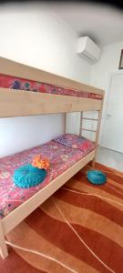 Postel nebo postele na pokoji v ubytování SUNNY HOLIDAY HOME