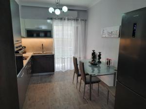 Kuchyňa alebo kuchynka v ubytovaní SummerSense Apartment