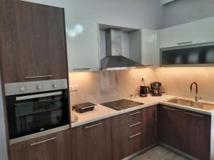 Kuchyňa alebo kuchynka v ubytovaní SummerSense Apartment