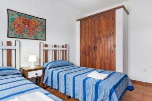 Postel nebo postele na pokoji v ubytování Casa Playamar + 18 fotografií
