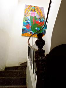a lighted umbrella on a ledge in a room at Pousada Estrela do Mar in Salvador
