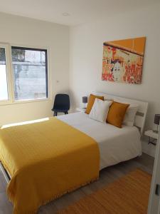 Postel nebo postele na pokoji v ubytování Holiday house Miramar by Ericeira