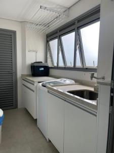 Kuchyň nebo kuchyňský kout v ubytování San Sebastian Riviera pé na areia
