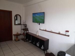 TV a/nebo společenská místnost v ubytování bel appart refait à neuf sur Tamouda Bay Tétouan