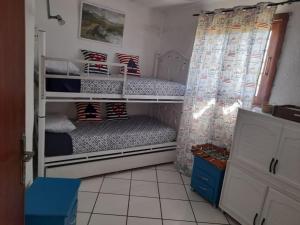 Postel nebo postele na pokoji v ubytování bel appart refait à neuf sur Tamouda Bay Tétouan