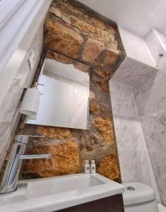 Kylpyhuone majoituspaikassa COIMBRA CITY CHARM