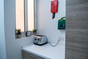 Köök või kööginurk majutusasutuses Seaside Cosy Maisonette @ Marsaskala - 2 mins walk from sea