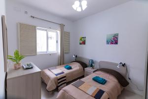 Voodi või voodid majutusasutuse Seaside Cosy Maisonette @ Marsaskala - 2 mins walk from sea toas