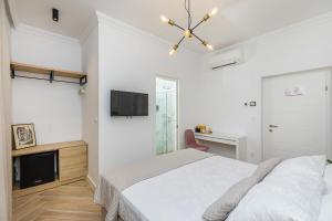 Ein Bett oder Betten in einem Zimmer der Unterkunft Rooms D&L, FREE Parking on-site
