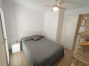 Postel nebo postele na pokoji v ubytování Apartament Port de la Selva