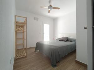 Postel nebo postele na pokoji v ubytování Apartament Port de la Selva