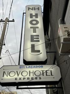 a sign for a noordorfrothrothrothroth at Novohotel Express in Santana do Livramento