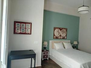 Ένα ή περισσότερα κρεβάτια σε δωμάτιο στο Petra House