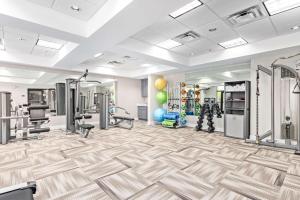 a gym with treadmills machines and exercise equipment at Fountain Park Hotel BW Signature Collection in Fountain Hills