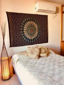 Ein Bett oder Betten in einem Zimmer der Unterkunft Balcones del boulevard