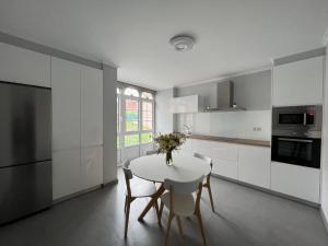 Kuchnia lub aneks kuchenny w obiekcie Apartamentos María de Lucía-Piso 2º