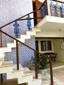 a row of stairs leading up to a balcony at Pousada Estrela do Mar in Salvador