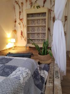 a bedroom with a bed and a dresser at Alas in Roldán +24 photos