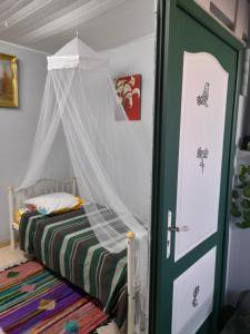 Postel nebo postele na pokoji v ubytování Maison LUCIA