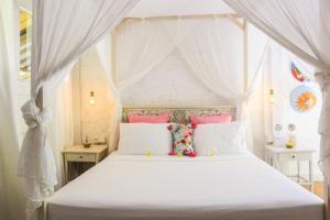 Letto o letti in una camera di Chanteak Bali