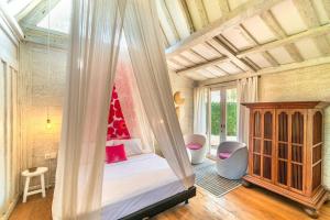 Letto o letti in una camera di Chanteak Bali