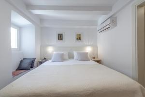 Posteľ alebo postele v izbe v ubytovaní Rooms Andro