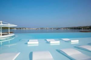 The swimming pool at or close to Nikki Beach Resort & Spa Porto Heli