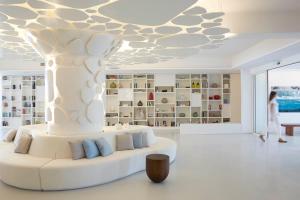 A seating area at Nikki Beach Resort & Spa Porto Heli