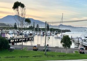 a marina with lots of boats in the water at Bermagui Stays - 2 bedroom Apartment - Amazing views & location in Bermagui