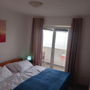 Postel nebo postele na pokoji v ubytování Apartment Renata