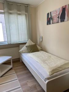 Postel nebo postele na pokoji v ubytování Gasthaus Stammbaum + 34 fotografií