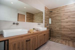 Ванна кімната в Terra Pietra Luxury Villas & Suites