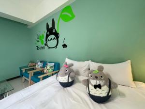 Rúm í herbergi á 檸檬樹