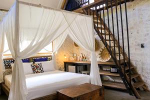 Letto o letti in una camera di Chanteak Bali