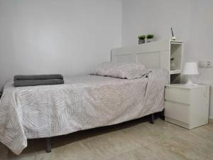 Posteľ alebo postele v izbe v ubytovaní El Tabanquito