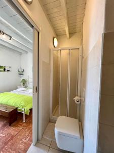 Postel nebo postele na pokoji v ubytování B&B By Lussy - Camera Verde + 4 fotografie