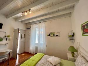 TV a/nebo společenská místnost v ubytování B&B By Lussy - Camera Verde