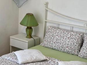 Postel nebo postele na pokoji v ubytování B&B By Lussy - Camera Verde