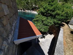 Bazén v ubytování Kamena kućica nebo v jeho okolí