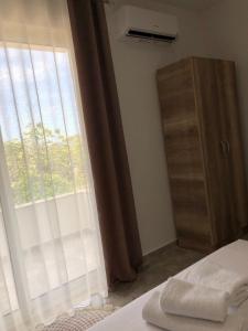 Postel nebo postele na pokoji v ubytování Apartments kupi ul rudaj 41