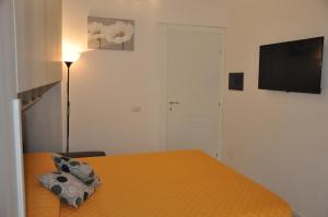 Postel nebo postele na pokoji v ubytování Brezza di mare Gaeta b&b