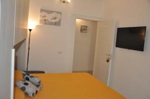 Postel nebo postele na pokoji v ubytování Brezza di mare Gaeta b&b