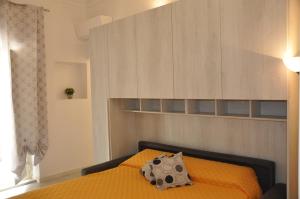 Postel nebo postele na pokoji v ubytování Brezza di mare Gaeta b&b