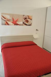 Postel nebo postele na pokoji v ubytování Brezza di mare Gaeta b&b