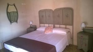 Vuode tai vuoteita majoituspaikassa Il Vicoletto di BIBI - B&B