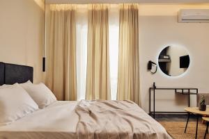 Postel nebo postele na pokoji v ubytování Amaroo Suites