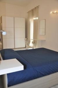 Postel nebo postele na pokoji v ubytování Brezza di mare Gaeta b&b