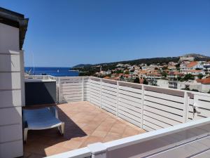 a balcony with a view of the ocean at La Casa di Elisa in Hvar